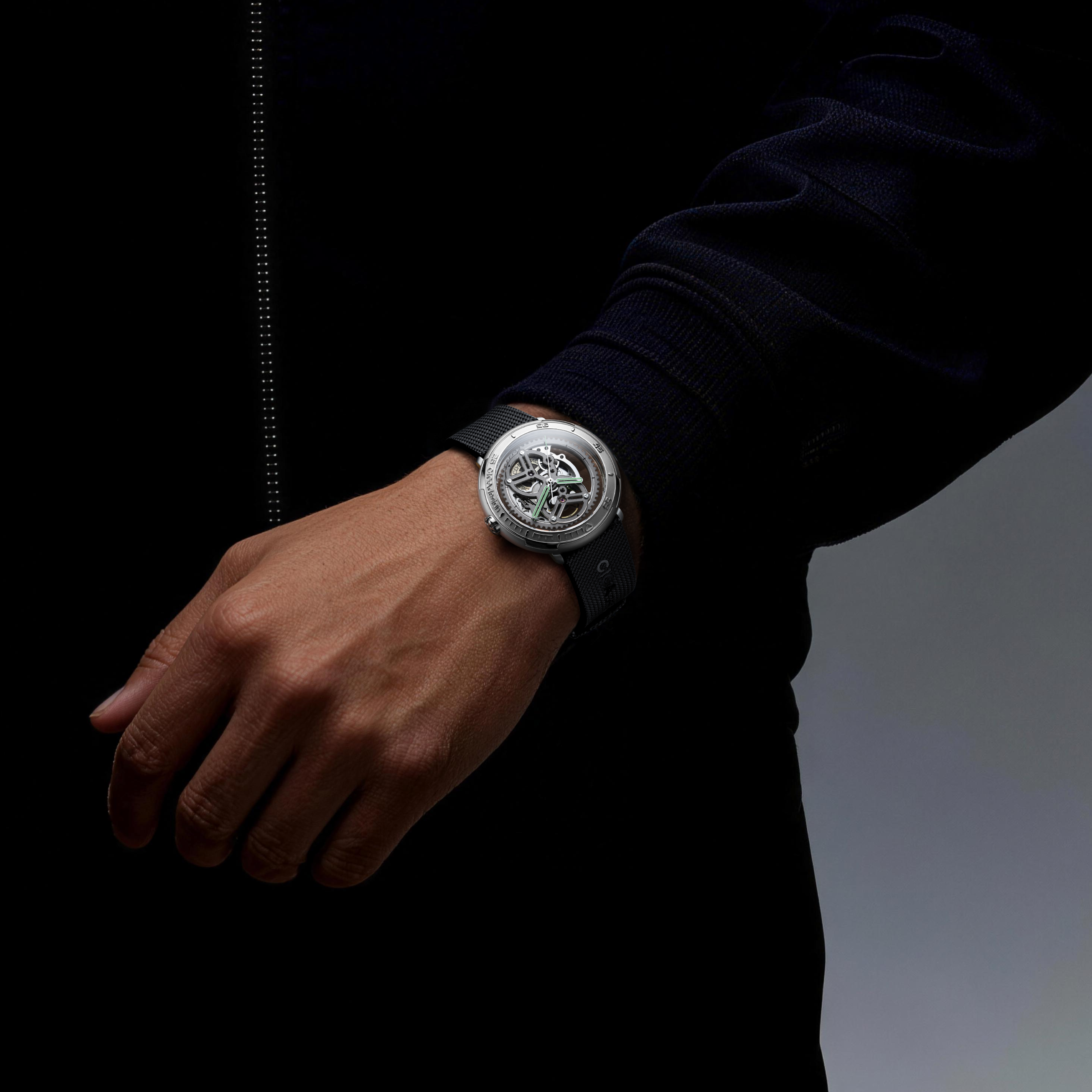 CIGA Design Vector Carbon skeleton automatic watch displayed on wrist during everyday wear featuring carbon titanium construction and skeleton movement